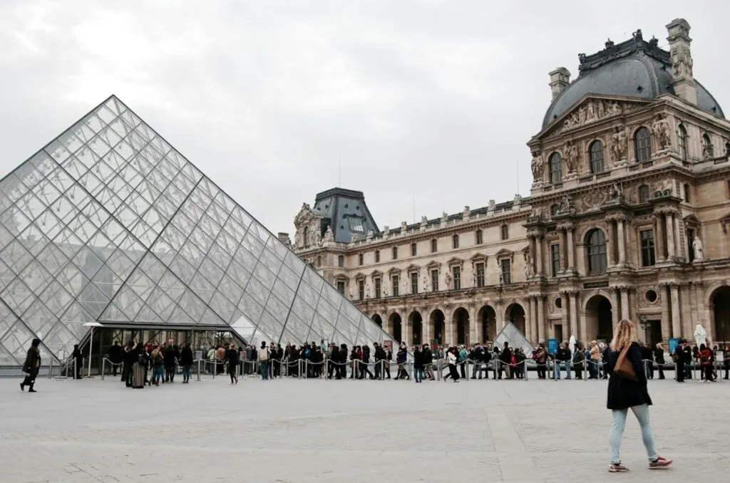 Long queue of tourists waiting to enter the Louvre Museum at the iconic glass pyramid entrance in Paris, France.These file names are SEO-friendly with descriptive keywords, while the meta titles and descriptions provide clear, concise information about each image's content.RetryClaude can make mistakes. Please double-check responses. Sonnet 4