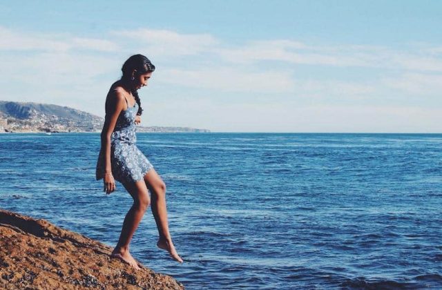 Woman-looking-at-the-water-travel-holiday